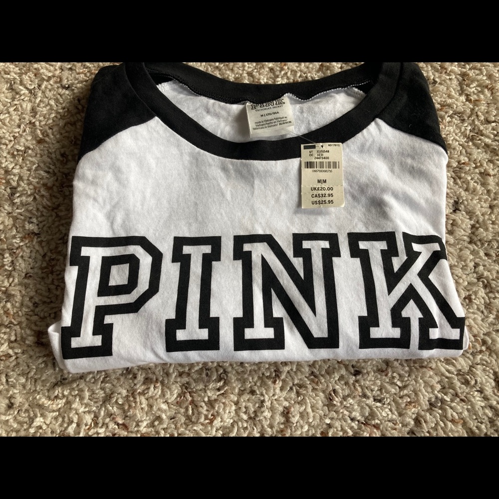 Pink T-Shirt 
White & Black
Size: M